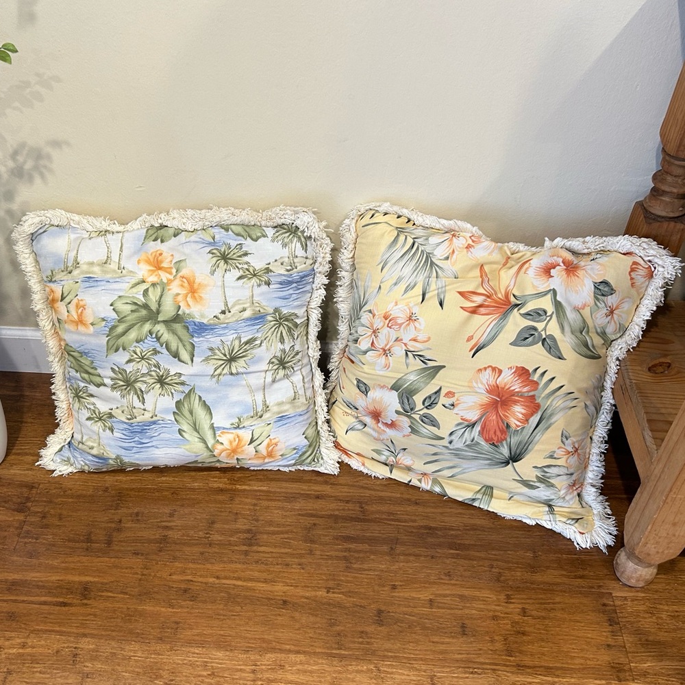 Two TOMMY BAHAMA Throw Pillows with Hawaiian floral print